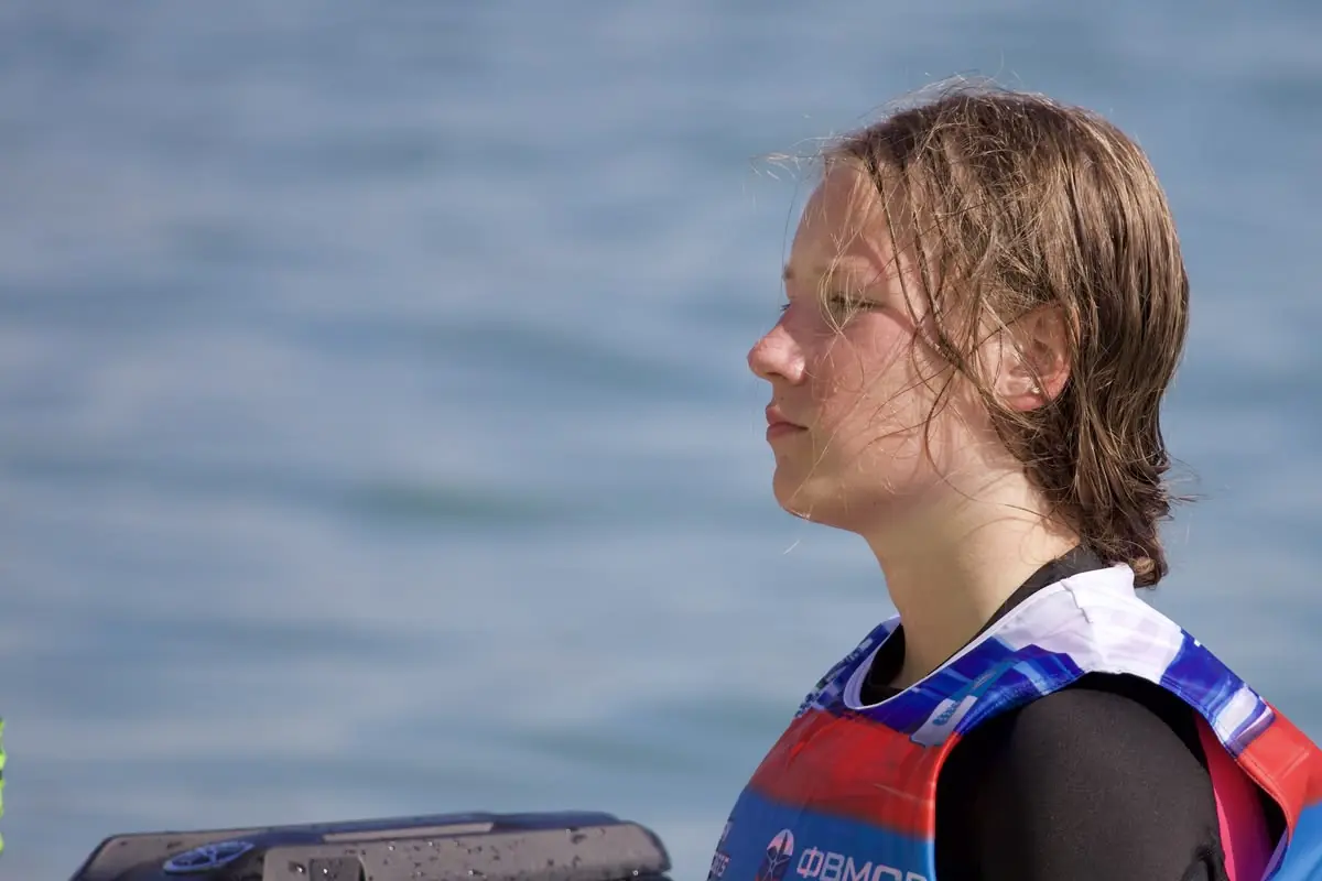 Portrait of Eva by the water after training